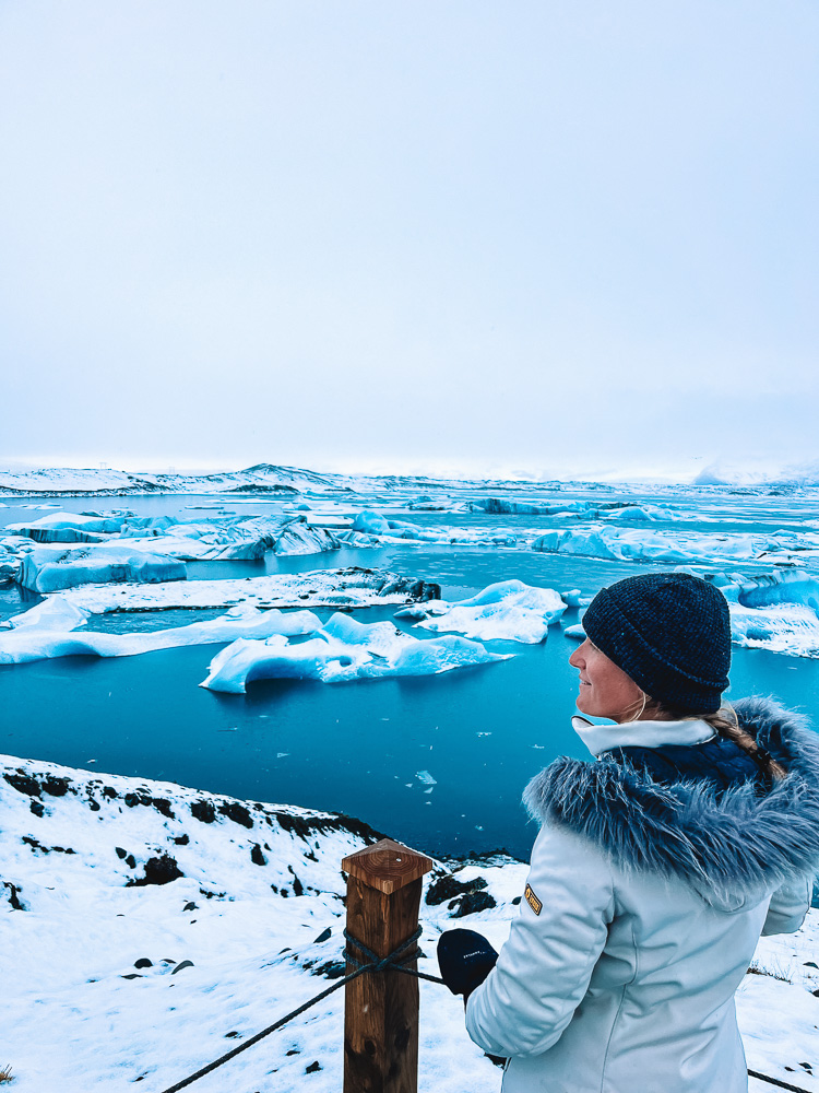 Glistening under the sun, the glacier's intricate patterns and deep crevices create a captivating natural masterpiece.