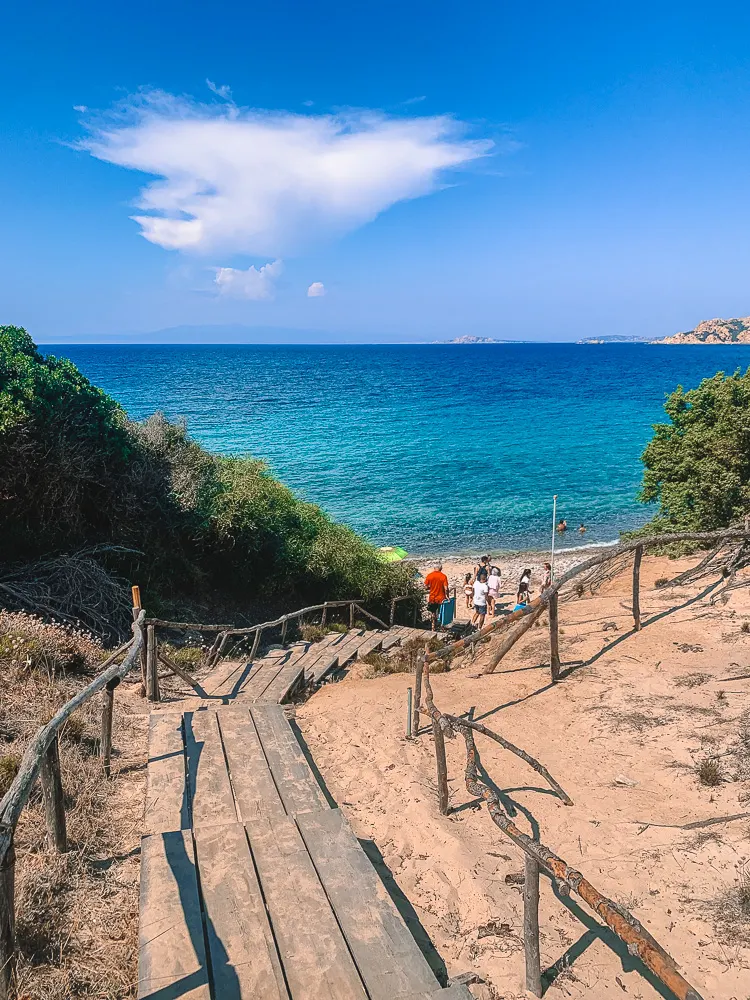 Walking down to Spiaggia di Lu Litarroni in Italy