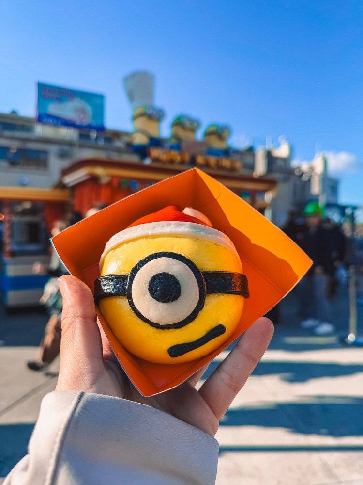Minion-themed steamed bao in hand at Universal Studios Osaka Japan.