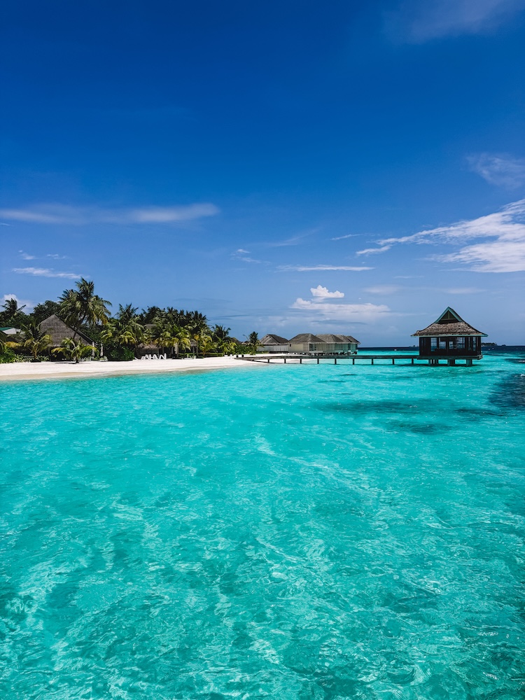The beautiful beach and lagoon at Nova Maldives, where you do the confined water dives