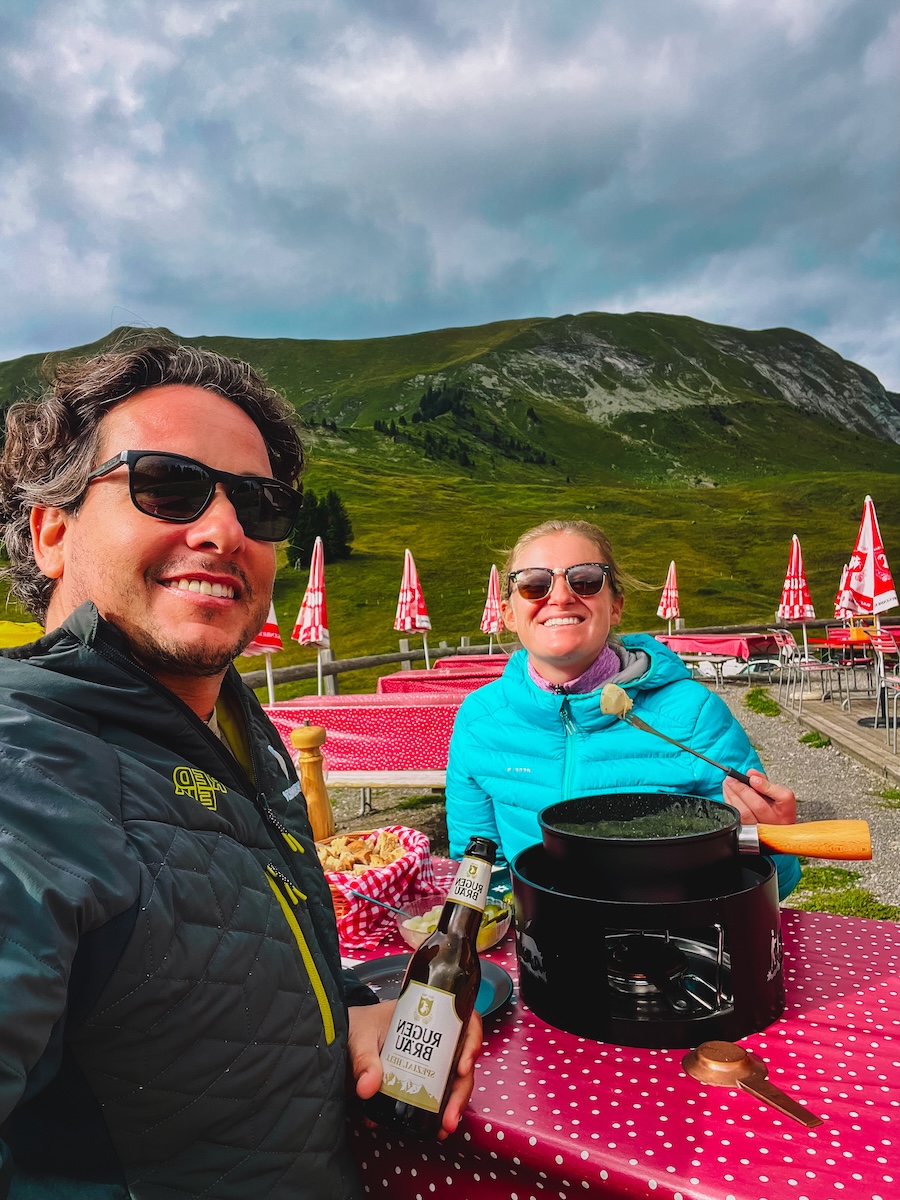 Enjoying a well deserved fondue after hiking Augstmatthorn in Switzerland